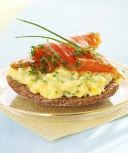 toast with scrambled eggs,salmon and chives