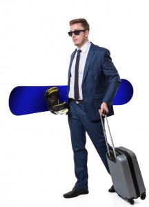 business man travelling with snow board iStock_000050964816_Small